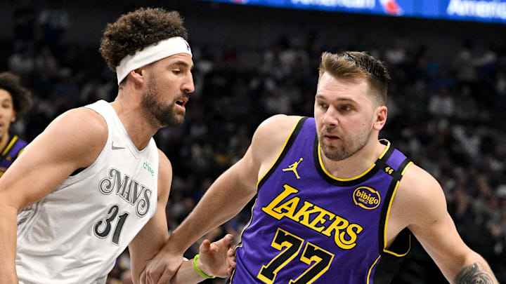 Dallas Mavericks guard Klay Thompson and Los Angeles Lakers guard Luka Doncic in action during the game between the Dallas Mavericks and the Los Angeles Lakers at American Airlines Center. Mandatory Credit: Jerome Miron-Imagn Images