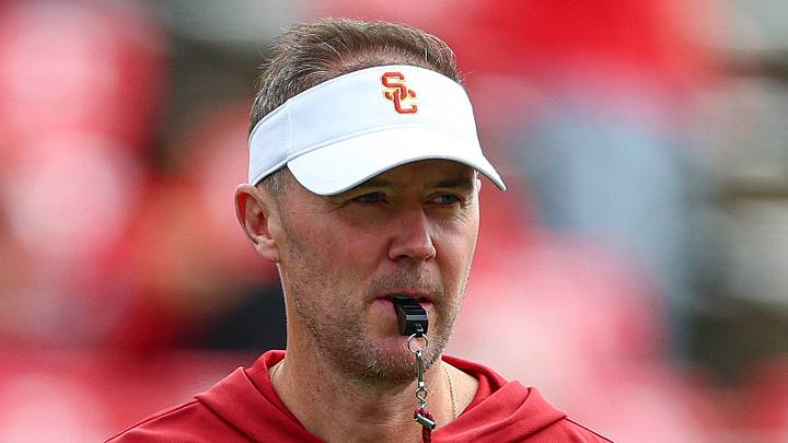 Sep 19, 2026; Piscataway, New Jersey, USA; USC Trojans head coach Lincoln Riley on the field during warm ups before the game against the Rutgers Scarlet Knights at SHI Stadium. Mandatory Credit: Vincent Carchietta-Imagn Images Sep 19, 2026; Piscataway, New Jersey, USA; USC Trojans head coach Lincoln Riley on the field during warm ups before the game against the Rutgers Scarlet Knights at SHI Stadium. Mandatory Credit: Vincent Carchietta-Imagn Images