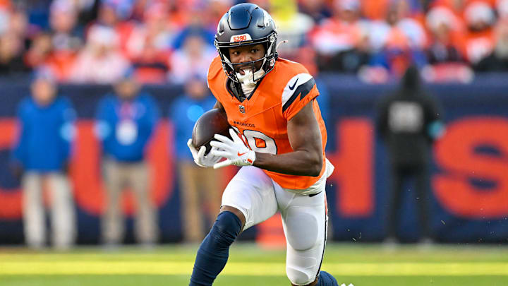 DENVER, CO - DECEMBER 15: Denver wide receiver Marvin Mims Jr. (19) runs the ball during a game between the Indianapolis Colts and the Denver Broncos at Empower Field at Mile High in Denver, CO on December 15, 2024. DENVER, CO - DECEMBER 15: Denver wide receiver Marvin Mims Jr. (19) runs the ball during a game between the Indianapolis Colts and the Denver Broncos at Empower Field at Mile High in Denver, CO on December 15, 2024.