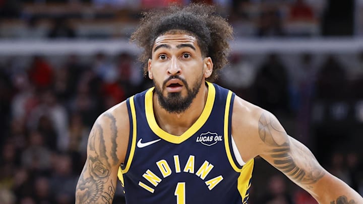 Indiana Pacers forward Obi Toppin (1) brings the ball up court against the Chicago Bulls during the first half at United Center.