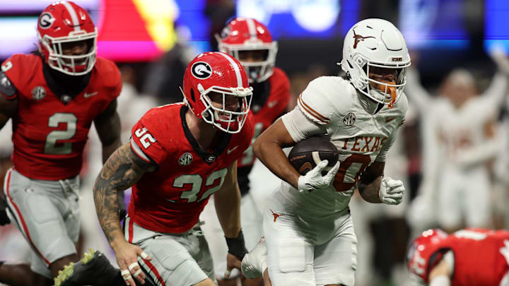 Texas Longhorns wide receiver DeAndre Moore Jr. makes a touchdown catch against the Georgia Bulldogs during the second half in the 2024 SEC Championship game at Mercedes-Benz Stadium.