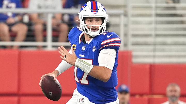 Buffalo Bills quarterback Josh Allen runs against the Detroit Lions during the first half at New Highmark Stadium. Buffalo Bills quarterback Josh Allen runs against the Detroit Lions during the first half at New Highmark Stadium.
