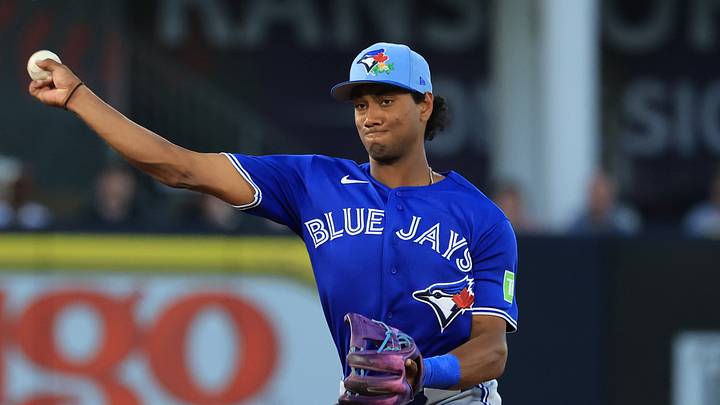 Tampa, Florida, USA;  Toronto Blue Jays infielder Arjun Nimmala (18) throws the ball to first base for an out during the third inning against the New York Yankees at George M. Steinbrenner Field. Mandatory Credit: Kim Klement Neitzel-Imagn Images