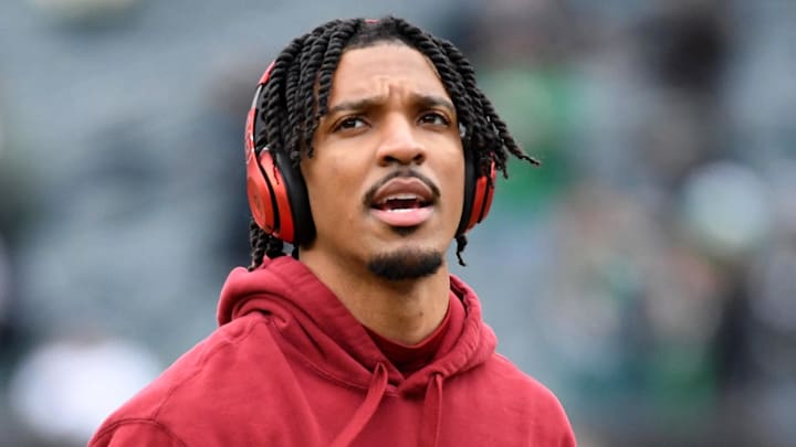 Jan 26, 2025; Philadelphia, PA, USA; Washington Commanders quarterback Jayden Daniels (5) looks on before the NFC Championship game at Lincoln Financial Field. Mandatory Credit: Eric Hartline-Imagn Images