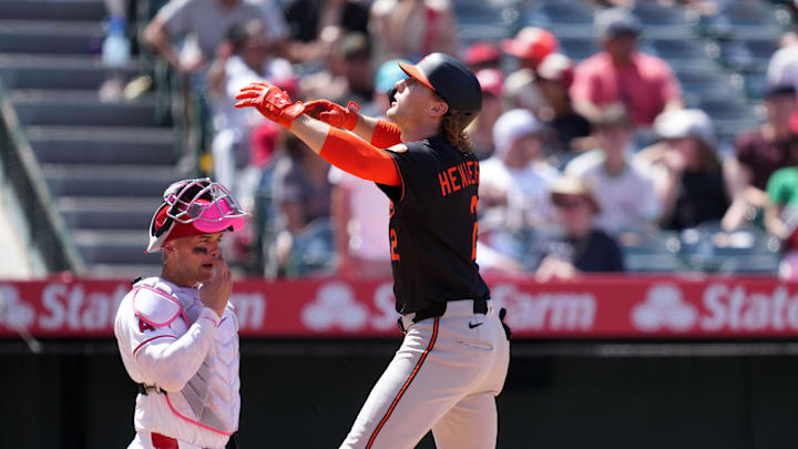 May 11, 2025; Anaheim, California, USA; Baltimore Orioles shortstop Gunnar Henderson (2) celebrates after hitting a two-run home run in the sixth inning as Los Angeles Angels catcher Logan O'Hoppe (14) watches at Angel Stadium. 