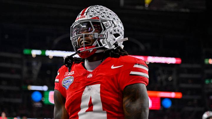 Dec 31, 2025; Arlington, TX, USA; Ohio State Buckeyes wide receiver Jeremiah Smith (4) celebrates after he runs for a touchdown during the 2025 Cotton Bowl and quarterfinal game of the College Football Playoff at AT&T Stadium. Mandatory Credit: Jerome Miron-Imagn Images