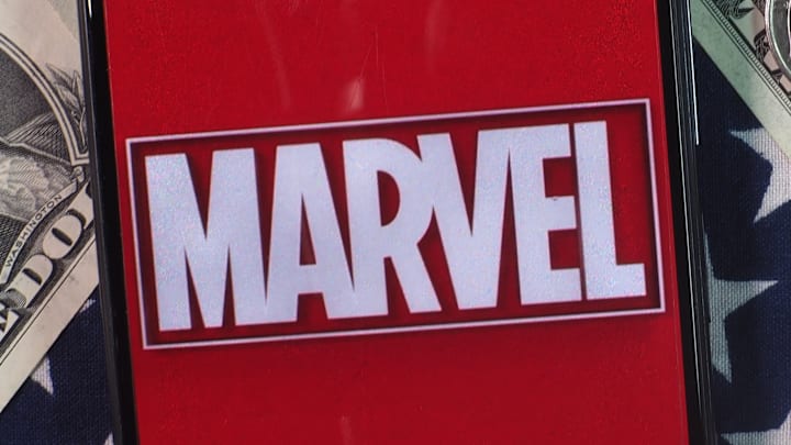 In this photo illustration, Marvel Entertainment logo seen...