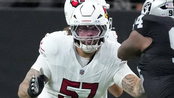 Aug 13, 2026; Paradise, Nevada, USA; Arizona Cardinals guard Chase Bisontis (57) defends against Las Vegas Raiders defensive tackle Benito Jones (94) and linebacker Tommy Eichenberg (44) in the first half at Allegiant Stadium. Mandatory Credit: Kirby Lee-Imagn Images Aug 13, 2026; Paradise, Nevada, USA; Arizona Cardinals guard Chase Bisontis (57) defends against Las Vegas Raiders defensive tackle Benito Jones (94) and linebacker Tommy Eichenberg (44) in the first half at Allegiant Stadium. Mandatory Credit: Kirby Lee-Imagn Images