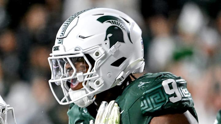 Michigan State's Jalen Thompson, right, celebrates his tackle for a safety against Western Michigan during the third quarter on Friday, Aug. 29, 2025, in East Lansing.