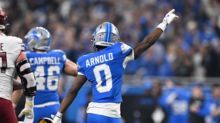 Detroit Lions cornerback Terrion Arnold (0) celebrates after a fourth down stop against the Washington Commanders 