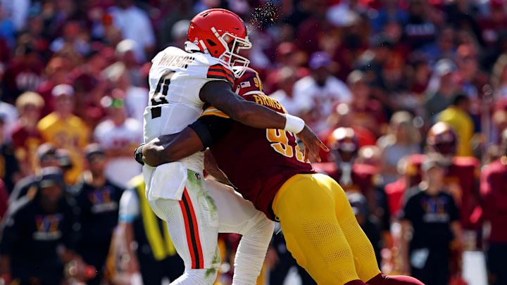 Oct 6, 2024; Landover, Maryland, USA; Cleveland Browns quarterback Deshaun Watson (4) is hit by Washington Commanders defensive end Dorance Armstrong (92) while throwing the ball during the second quarter at NorthWest Stadium. Mandatory Credit: Peter Casey-Imagn Images Oct 6, 2024; Landover, Maryland, USA; Cleveland Browns quarterback Deshaun Watson (4) is hit by Washington Commanders defensive end Dorance Armstrong (92) while throwing the ball during the second quarter at NorthWest Stadium. Mandatory Credit: Peter Casey-Imagn Images