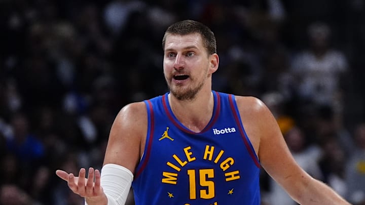 May 9, 2025; Denver, Colorado, USA; Denver Nuggets center Nikola Jokic (15) reacts to a foul called in the first half against the Oklahoma City Thunder during game three of the second round for the 2025 NBA Playoffs at Ball Arena. Mandatory Credit: Ron Chenoy-Imagn Images