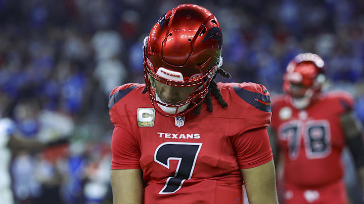 Nov 10, 2024; Houston, Texas, USA; Houston Texans quarterback C.J. Stroud (7) walks off the field after throwing an interception during the third quarter against the Detroit Lions at NRG Stadium. Mandatory Credit: Troy Taormina-Imagn Images