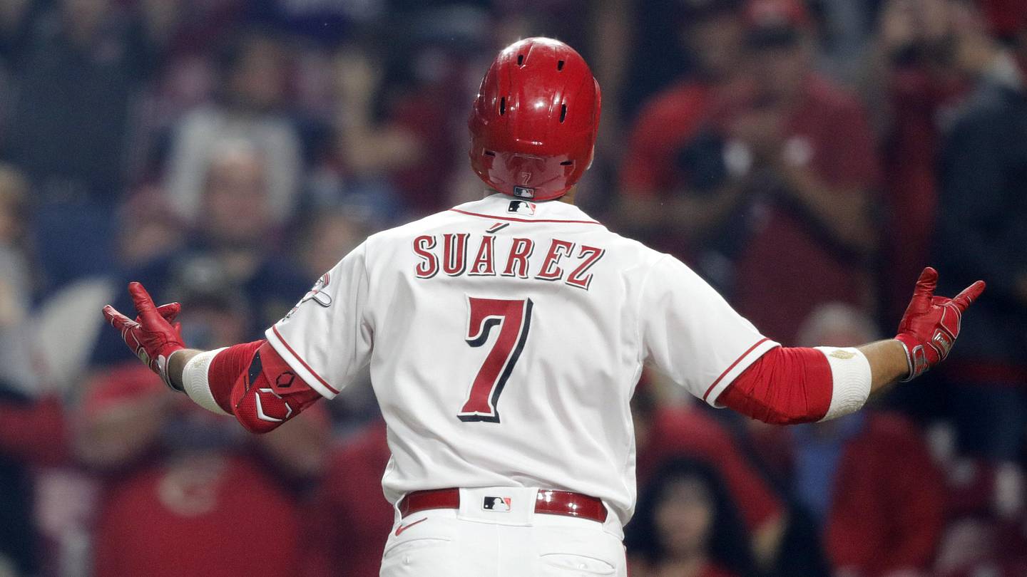Reds fans pushed for Eugenio Suarez to take No. 7 but he chose differently