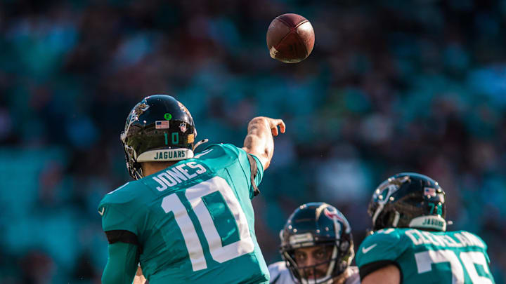 Dec 1, 2024; Jacksonville, Florida, USA; Jacksonville Jaguars quarterback Mac Jones (10) throws the ball against the Houston Texans in the third quarter at EverBank Stadium. Mandatory Credit: Jeremy Reper-Imagn Images
