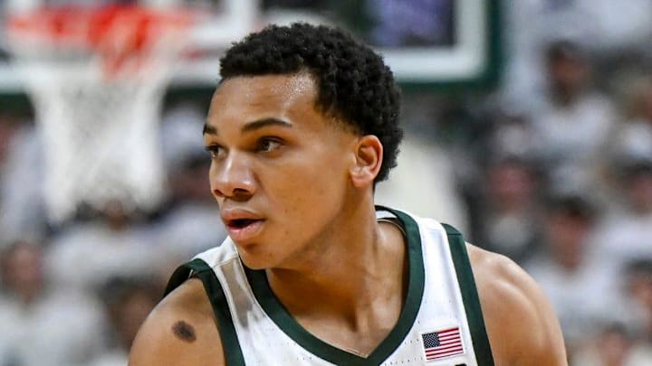 Michigan State's Divine Ugochukwu moves the ball against Arkansas during the first half on Saturday, Nov. 8, 2025, at the Breslin Center in East Lansing.