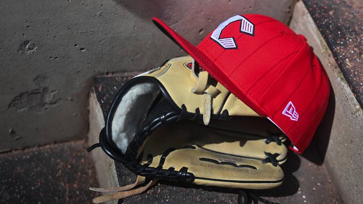 Apr 11, 2026; Cincinnati, Ohio, USA; A view of an official Cincinnati Reds hat on the dugout steps during the game against the Los Angeles Angels at Great American Ball Park. Mandatory Credit: Aaron Doster-Imagn Images Apr 11, 2026; Cincinnati, Ohio, USA; A view of an official Cincinnati Reds hat on the dugout steps during the game against the Los Angeles Angels at Great American Ball Park. Mandatory Credit: Aaron Doster-Imagn Images
