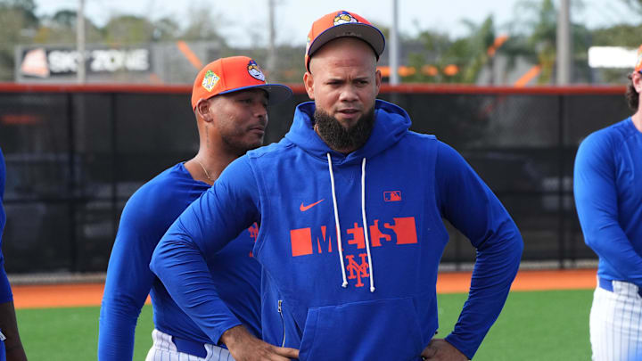 Feb 11, 2026; Port St. Lucie, FL, USA;  New York Mets pitcher Luis Garcia warms-up with pitchers during spring practice. Mandatory Credit: Jim Rassol-Imagn Images