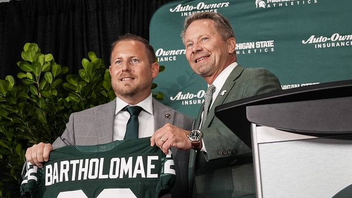 MSU President Kevin Guskiewicz, right, poses with Dan Bartholomae, the school's new Director of Athletics and Vice President, during a special press conference, Wednesday, Aug. 19, 2026, at the Breslin Center in East Lansing. MSU President Kevin Guskiewicz, right, poses with Dan Bartholomae, the school's new Director of Athletics and Vice President, during a special press conference, Wednesday, Aug. 19, 2026, at the Breslin Center in East Lansing.