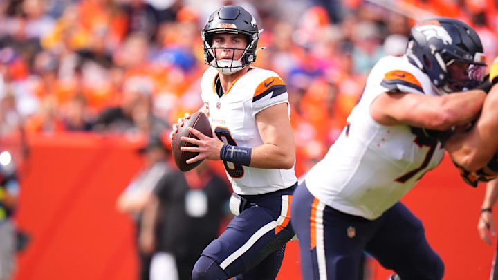 Sep 15, 2024; Denver, Colorado, USA; Denver Broncos quarterback Bo Nix (10) drops to pass in the second quarter against the Pittsburgh Steelers at Empower Field at Mile High. 