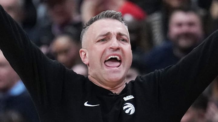 Toronto Raptors head coach Darko Rajakovic reacts during the play against the Miami Heat.