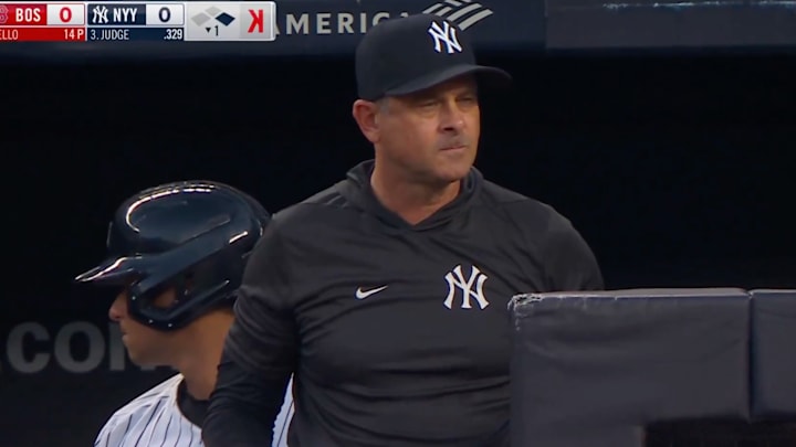 Aaron Boone reacting to umpire Lance Barrett’s work behind the plate. 