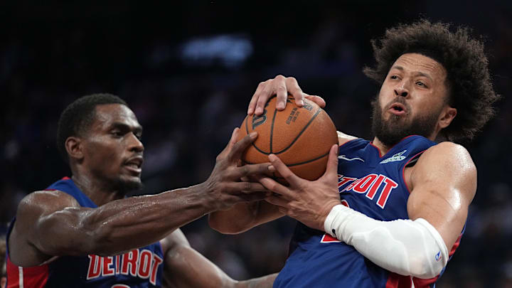 Jan 30, 2026; San Francisco, California, USA; Detroit Pistons guard Cade Cunningham (2) holds onto a rebound next to center Jalen Duren (0) against the Golden State Warriors in the fourth quarter at the Chase Center. Mandatory Credit: Cary Edmondson-Imagn Images
