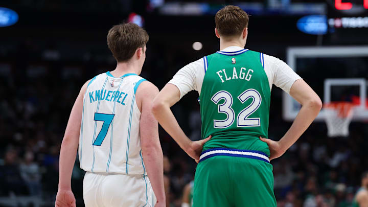 Jan 29, 2026; Dallas, Texas, USA;  Charlotte Hornets guard Kon Knueppel (7) stands with Dallas Mavericks forward Cooper Flagg (32) during the second half at American Airlines Center. Mandatory Credit: Kevin Jairaj-Imagn Images