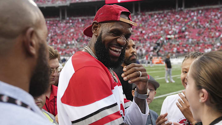 Sep 3, 2022; Columbus, Ohio, USA;  LeBron James talks to fans prior to the NCAA football game between the Ohio State Buckeyes and Notre Dame Fighting Irish at Ohio Stadium. Mandatory Credit: Adam Cairns-Imagn Images
