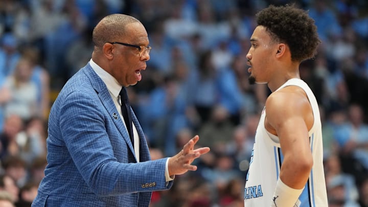Feb 28, 2026; Chapel Hill, North Carolina, USA; North Carolina Tar Heels head coach Hubert Davis with guard Seth Trimble (7) in the second half at Dean E. Smith Center. Mandatory Credit: Bob Donnan-Imagn Images