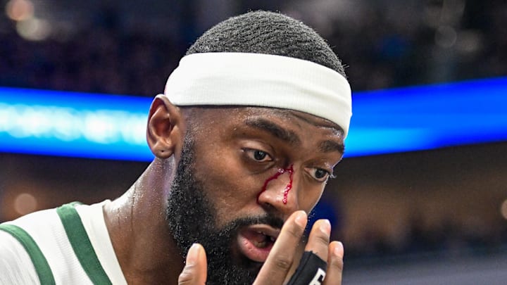 Milwaukee Bucks forward Bobby Portis (9) reacts after getting a cut on his nose after a foul in the fourth quarter against the Utah Jazz at Fiserv Forum on November 7, 2024.