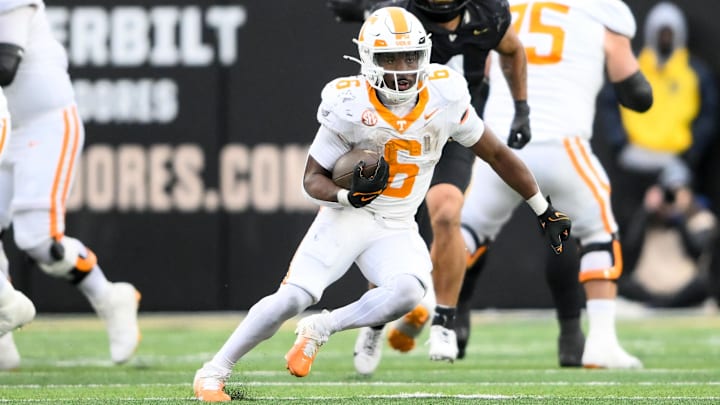 Nov 30, 2024; Nashville, Tennessee, USA; Tennessee Volunteers running back Dylan Sampson (6) runs the ball against the Vanderbilt Commodores during the second half at FirstBank Stadium. Nov 30, 2024; Nashville, Tennessee, USA; Tennessee Volunteers running back Dylan Sampson (6) runs the ball against the Vanderbilt Commodores during the second half at FirstBank Stadium.