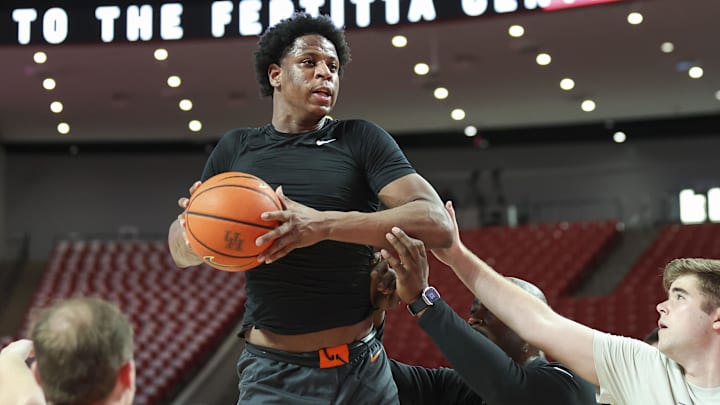 Feb 6, 2024; Houston, Texas, USA; Oklahoma State Cowboys forward Justin McBride (21) warms up before the game against the Houston Cougars at Fertitta Center. Mandatory Credit: Troy Taormina-Imagn Images