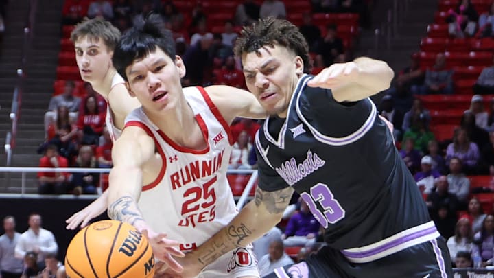 Feb 17, 2025; Salt Lake City, Utah, USA; Utah Utes guard Mike Sharavjamts (25) and Kansas State Wildcats guard Coleman Hawkins (33) play for a loose ball during the first half at Jon M. Huntsman Center. Mandatory Credit: Rob Gray-Imagn Images Feb 17, 2025; Salt Lake City, Utah, USA; Utah Utes guard Mike Sharavjamts (25) and Kansas State Wildcats guard Coleman Hawkins (33) play for a loose ball during the first half at Jon M. Huntsman Center. Mandatory Credit: Rob Gray-Imagn Images