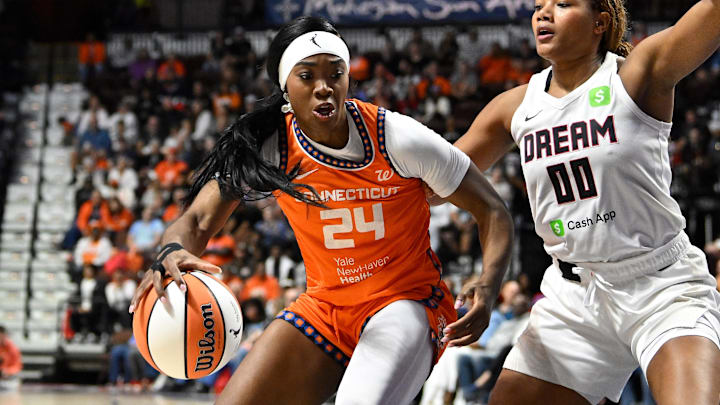 Connecticut Sun forward Aneesah Morrow (24) battles Atlanta Dream forward Naz Hillmon (00) to the basket during the second half at Mohegan Sun Arena. Connecticut Sun forward Aneesah Morrow (24) battles Atlanta Dream forward Naz Hillmon (00) to the basket during the second half at Mohegan Sun Arena.