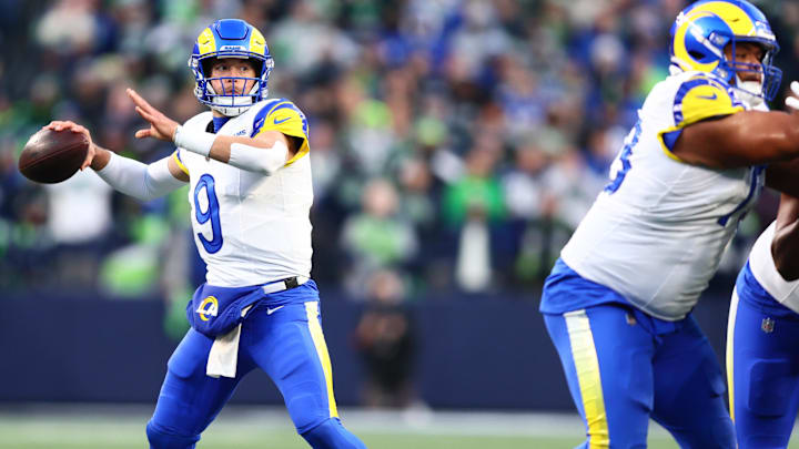 Jan 25, 2026; Seattle, WA, USA; Los Angeles Rams quarterback Matthew Stafford (9) passes against the Seattle Seahawks during the first half in the 2026 NFC Championship Game at Lumen Field. Mandatory Credit: Kevin Ng-Imagn Images