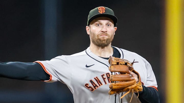 Aug 18, 2025; San Diego, California, USA; San Francisco Giants third baseman Casey Schmitt (10) throws to first base for a out during the third inning against the San Diego Padres at Petco Park. Mandatory Credit: David Frerker-Imagn Images