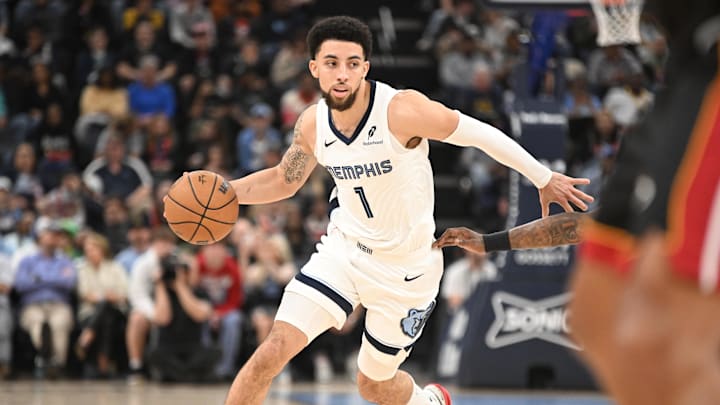 Mar 15, 2025; Memphis, Tennessee, USA; Memphis Grizzlies guard Scotty Pippen Jr. (1) dribbles at the top of the key in the fourth quarter of the game against the Miami Heat at FedExForum. Mandatory Credit: Matthew Smith-Imagn Images