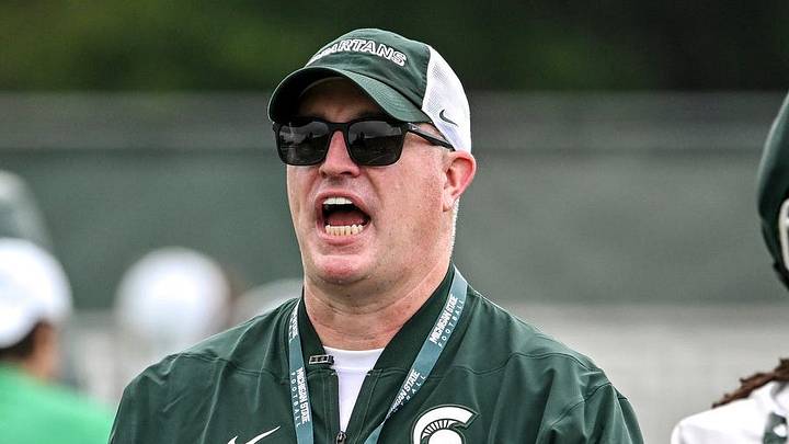 Michigan State’s head coach Pat Fitzgerald calls out to players during football practice on Thursday, Aug. 6, 2026, in East Lansing. Michigan State’s head coach Pat Fitzgerald calls out to players during football practice on Thursday, Aug. 6, 2026, in East Lansing.
