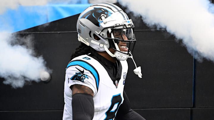 Dec 15, 2024; Charlotte, North Carolina, USA;  Carolina Panthers cornerback Jaycee Horn (8) runs on to the field before the game at Bank of America Stadium. Mandatory Credit: Bob Donnan-Imagn Images