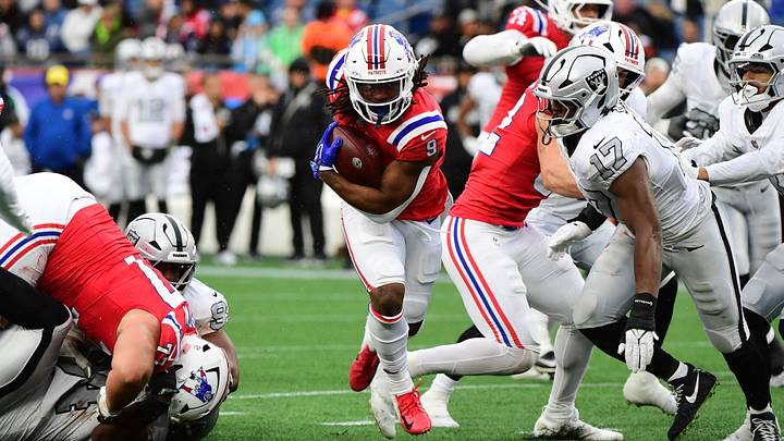 Oct 11, 2026; Foxborough, Massachusetts, USA; New England Patriots running back Corey Kiner (9) runs the ball while Las Vegas Raiders linebacker Nakobe Dean (17) defends during the second half at Gillette Stadium. Mandatory Credit: Bob DeChiara-Imagn Images Oct 11, 2026; Foxborough, Massachusetts, USA; New England Patriots running back Corey Kiner (9) runs the ball while Las Vegas Raiders linebacker Nakobe Dean (17) defends during the second half at Gillette Stadium. Mandatory Credit: Bob DeChiara-Imagn Images