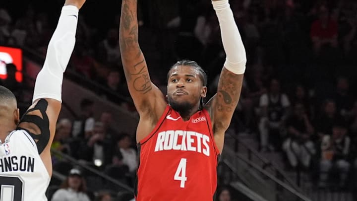 Oct 26, 2024; San Antonio, Texas, USA; Houston Rockets guard Jalen Green (4) shoots over San Antonio Spurs forward Keldon Johnson (0) in the first half at Frost Bank Center. Mandatory Credit: Daniel Dunn-Imagn Images Oct 26, 2024; San Antonio, Texas, USA; Houston Rockets guard Jalen Green (4) shoots over San Antonio Spurs forward Keldon Johnson (0) in the first half at Frost Bank Center. Mandatory Credit: Daniel Dunn-Imagn Images