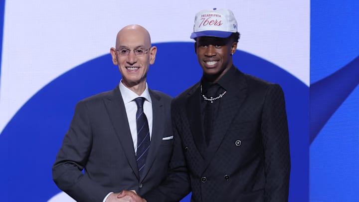 Jun 25, 2025; Brooklyn, NY, USA;  VJ Edgecombe stands with NBA commissioner Adam Silver after being selected as the third pick by the Philadelphia 76ers in the first round of the 2025 NBA Draft at Barclays Center. Mandatory Credit: Brad Penner-Imagn Images