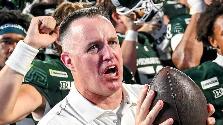 Michigan State’s head coach Pat Fitzgerald, center, sings the fight song with the team after defeating Toledo on Friday, Sept. 4, 2026, at Spartan Stadium in East Lansing.