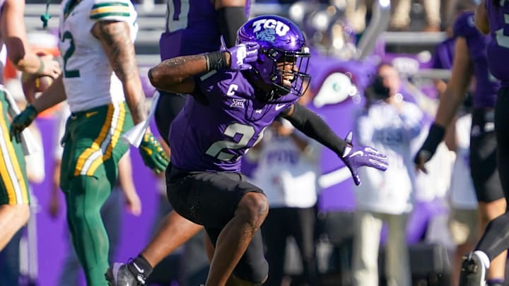 Oct 18, 2025; Fort Worth, Texas, USA; TCU Horned Frogs safety Bud Clark (21) reacts after sacking Baylor Bears quarterback Sawyer Robertson (13) during the second half of a game at Amon G. Carter Stadium. Mandatory Credit: Raymond Carlin III-Imagn Images