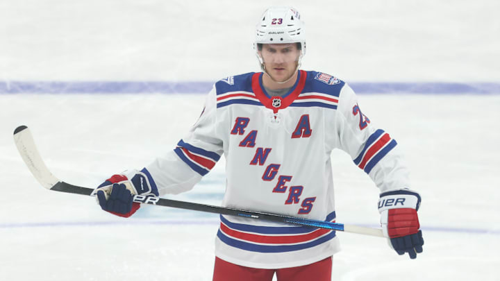 Oct 11, 2025; Pittsburgh, Pennsylvania, USA;  New York Rangers defenseman Adam Fox (23) warms up before the game against the Pittsburgh Penguins at PPG Paints Arena. Mandatory Credit: Charles LeClaire-Imagn Images