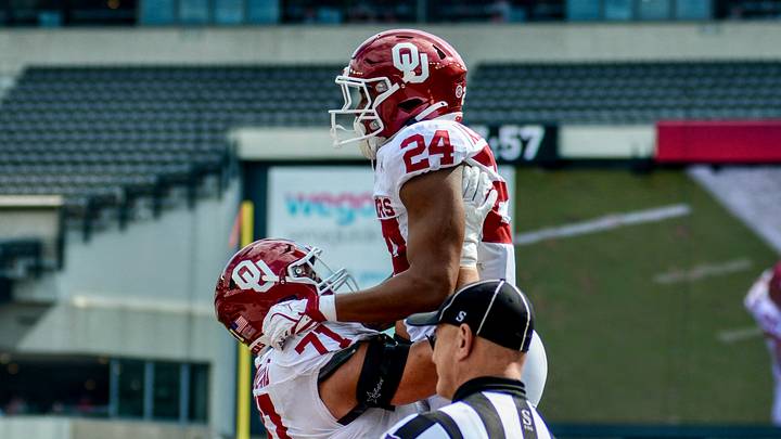 Oklahoma running back Xavier Robinson celebrates after scoring a touchdown against Temple. Oklahoma running back Xavier Robinson celebrates after scoring a touchdown against Temple.