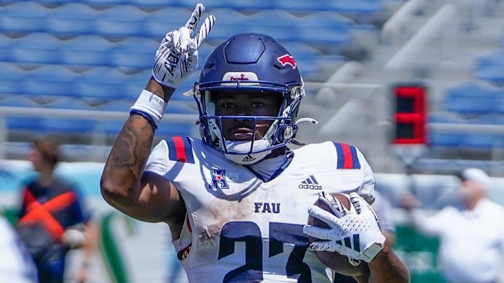 Running back Gemari Sands (23) celebrates a touchdown during the Spring Game at FAU Stadium on Saturday, April 13, 2024, in Boca Raton, FL.