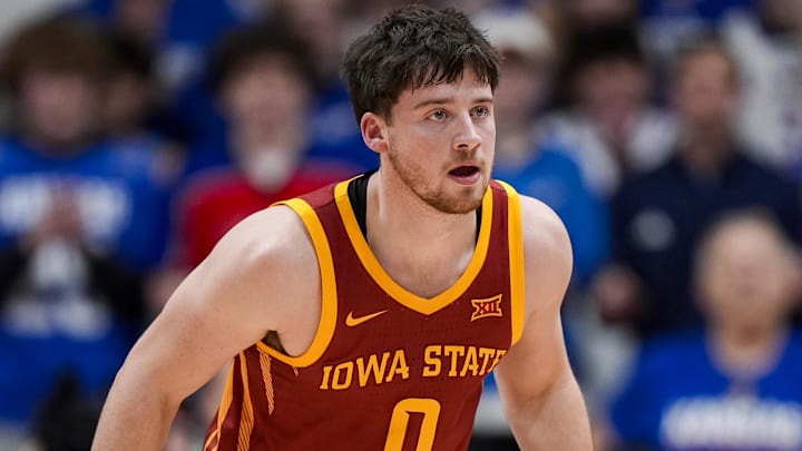 Jan 13, 2026; Lawrence, Kansas, USA; Iowa State Cyclones guard Nate Heise (0) defends during the second half against the Kansas Jayhawks at Allen Fieldhouse.