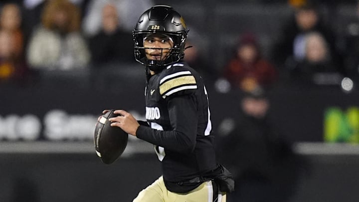Nov 22, 2025; Boulder, Colorado, USA; Colorado Buffaloes quarterback Julian Lewis (10) scrambles in the first quarter against the Arizona State Sun Devils at Folsom Field. Mandatory Credit: Ron Chenoy-Imagn Images
